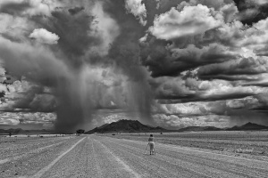 Photographing the storm, photographer in Namibia. Private Photo Tours