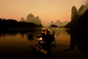 Guilin Cormorant Fisherman Golden Hour. China Photo Tour