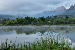 Misty Sunrise Royal Natal National Park. South Africa Photo Tour