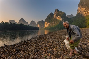 Portrait Chinese Man along Li River Xingping. Photo Tour China
